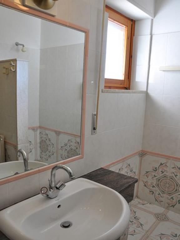 Hotel L'Oasi Кала-Гононе Номер фото